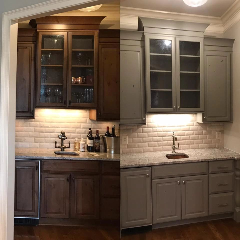 Kitchen cabinets refinished in soft gray with subway tile backsplash, before and after